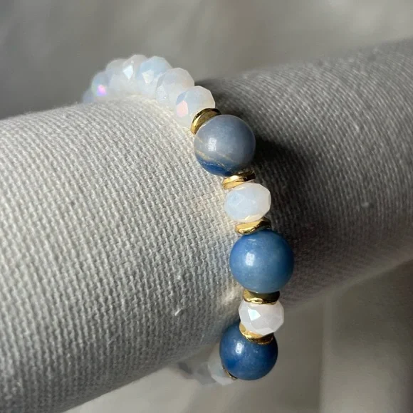 White and Dark Blue Beaded Stretchy Bracelet with Small Gold Accent Beads - Picture 2 of 3
